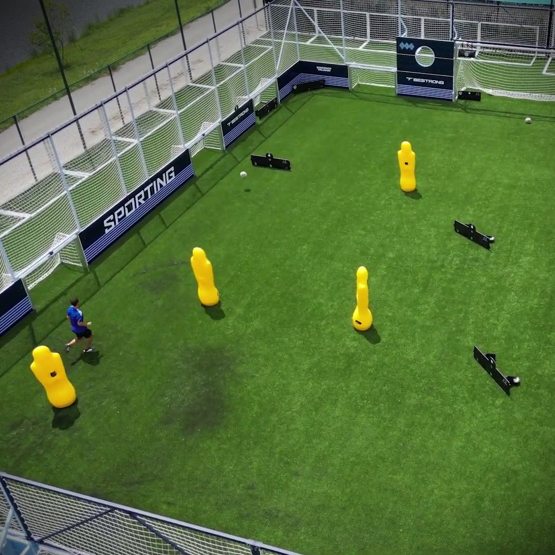 Arena with dummies inside and Goal Station rebounds, male running