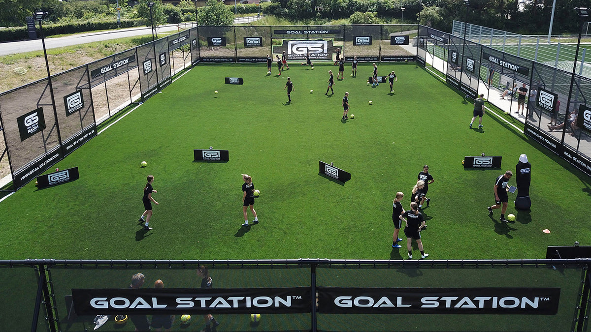 Players training inside a Goal Station Arena
